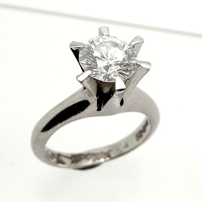 立て爪の婚約指輪をダイヤを低くセットしたシンプルな立爪リングに ...